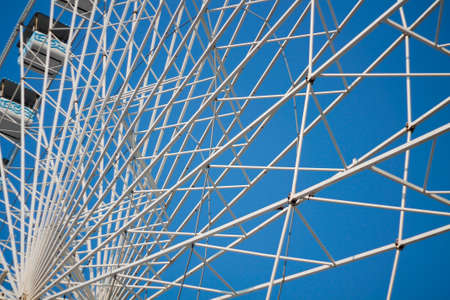 Ferris wheel and metal structure in a funfair