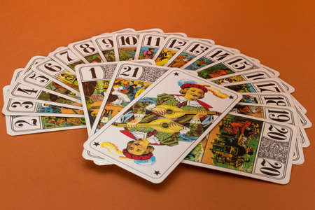Fan of trumps with a Tarot deckの写真素材