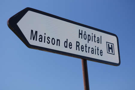 Sign indicating a health center including a hospital and a retirement homeの写真素材