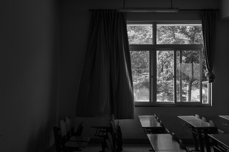 interior of a classroom in black and white
