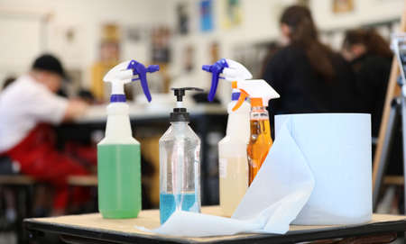 Inside a covid safe classroom in a school environment. Cleaning and sanitary products including hand...