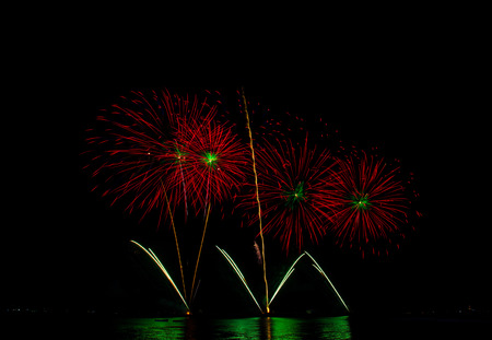 Fireworks light up the sky black backgroundの写真素材