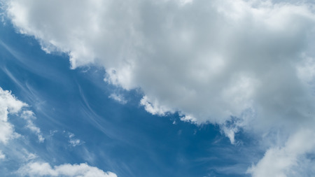 big cloud on the blue sky backgroundの写真素材