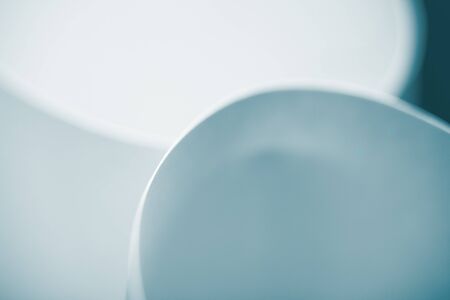 a macro, abstract, background picture of white sheets of paper, in circular, curved shape. の写真素材