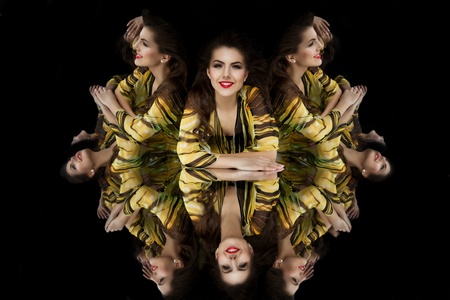 brunette girl shopping bag kaleidoscope mirrors smilingの写真素材