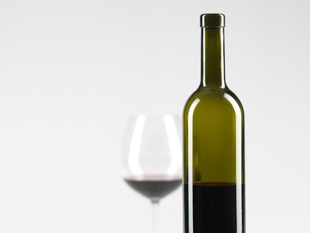 bottle of wine and glass with red wine, copy spaceの写真素材