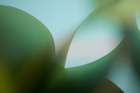 graphic abstract image of colorful origami pattern made of curved sheets of paperの写真素材