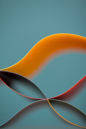 graphic abstract image of colorful origami pattern made of curved sheets of paper
