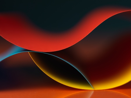 graphic macro image of colorful origami pattern made of curved sheets of paperの写真素材