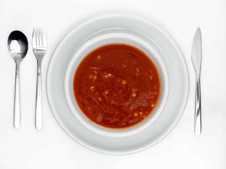 tomato soup on white backgroundの写真素材