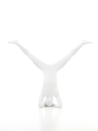 unknown faceless man sitting in yoga positionの写真素材