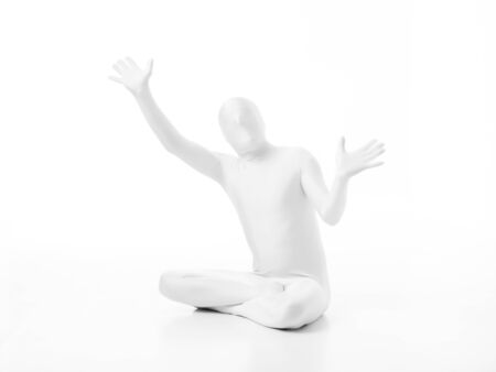 faceless man dressed  white with hands in position mimeの写真素材