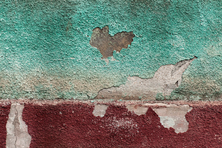 old wall texture peeling green red and traces of moldの写真素材