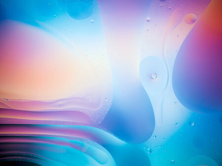 beautiful mixture of oil and water on colorful background