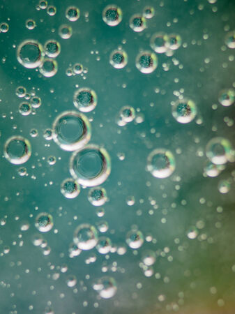 oil on water background resembling sparkling water