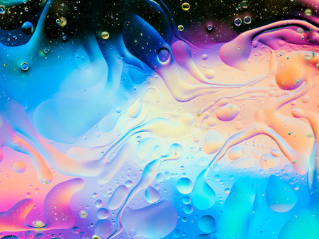 colorful horizontal composition with transparent oil drops on waterの写真素材
