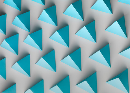 abstract background consisting of blue pyramid paper shapes