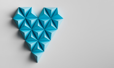 abstract heart shape made out of paper pyramids. copy space availableの写真素材