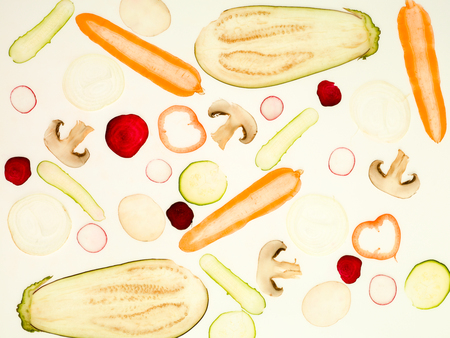 backlit textured vegetable zucchini onion mushroom radish beetroot eggplant pepper orizontalの写真素材