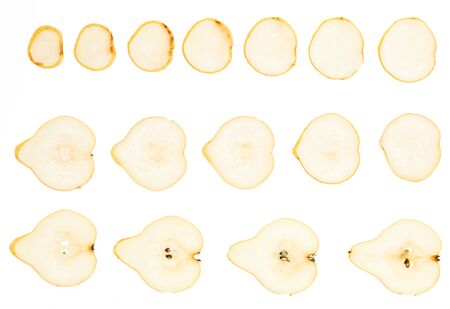 pear slices on white background sits low to high upper viewの写真素材