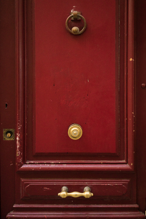 Blue door with bronze detailsの写真素材