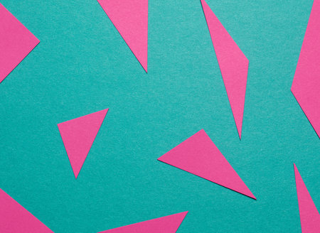 Abstract background made of paper pink and turquoiseの写真素材