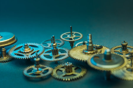 Detail of cogwheels in old clock blue Backgroundの写真素材