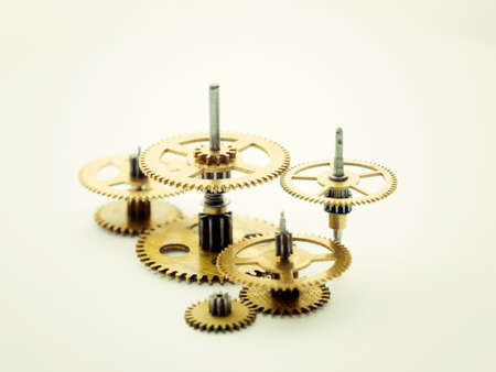 Gears and cogs macro, blue background. Side view. Vintage