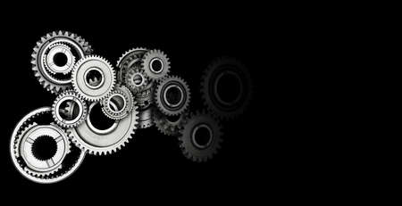 Industrial gears and cogs on black background. Copy space.の写真素材
