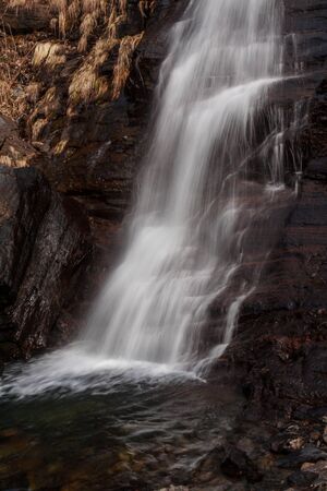 Cold waterfall in italian mountainの写真素材