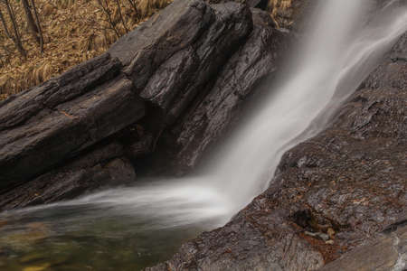 Cold waterfall in italian mountainの写真素材