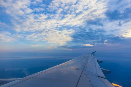 Blue sky and airplane wingsのeditorial素材