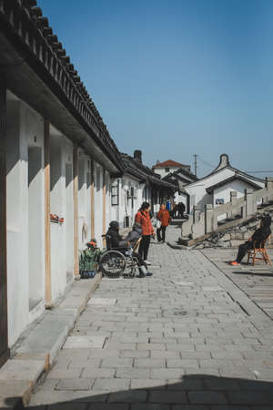 Wooden House on Stone Road in Qingxi Old Street (partial black and white)
