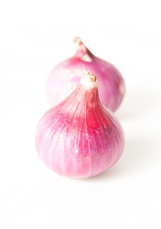 Raw red onion isolated on white background with clipping pathの写真素材