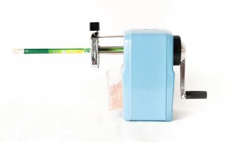 sharpener in side view with pencil on white backgroundの写真素材