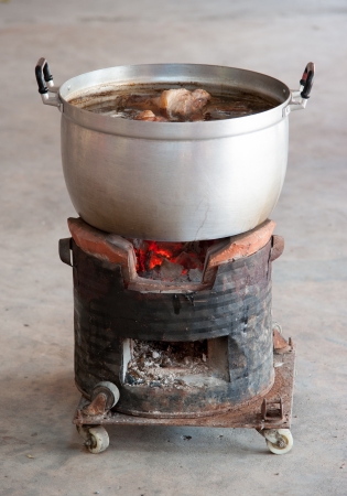 Thai curry soup is boiling in the aluminum pot.の素材 [FY31018953686]