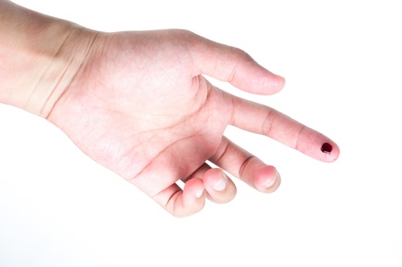 finger with blood isolatedの写真素材