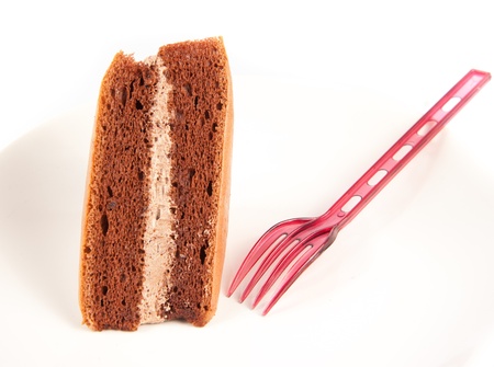 chocolate cake great for during coffee break isolated on whiteの写真素材