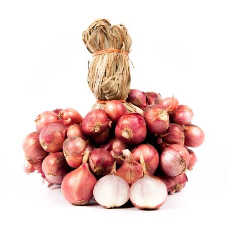 Shallots on white background (Allium ascalonicum)の写真素材