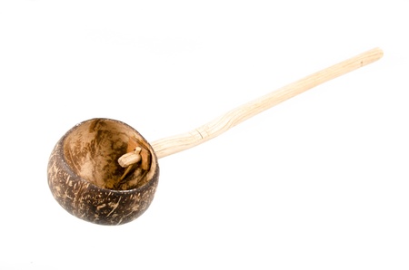 dipper made from Coconut shell on white backgroundの写真素材