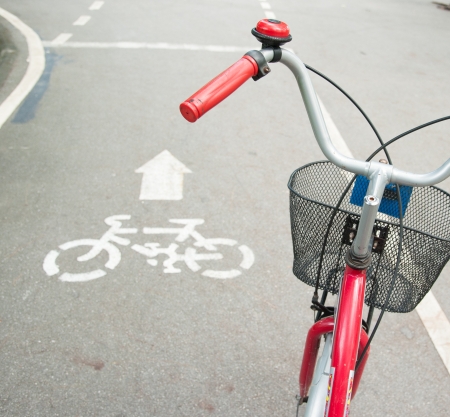 Bicycle road sign and bike ridersの写真素材