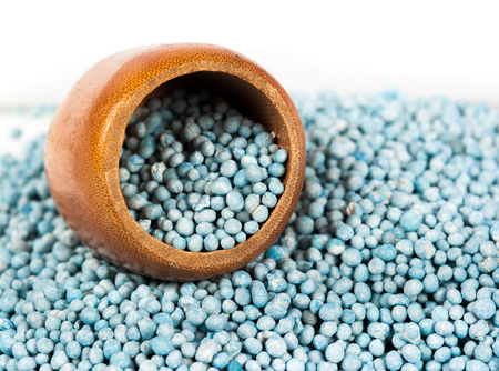 Blue fertilizer on white backgroundの写真素材