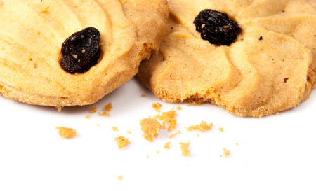 Oatmeal cookies with raisin on a white backgroundの写真素材