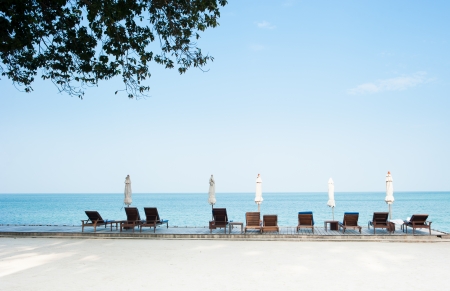 Beach chairs on perfect tropical white sand beachの写真素材