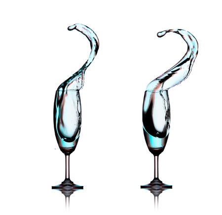 splashing water wave in the wine glass on white backgroundの写真素材