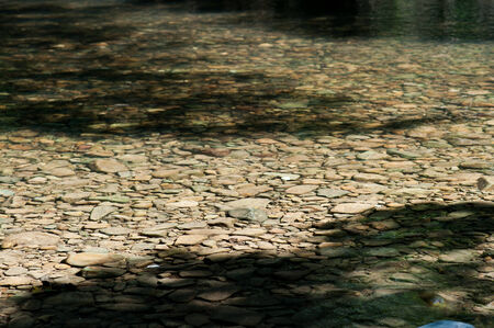 Stones under water. Background.