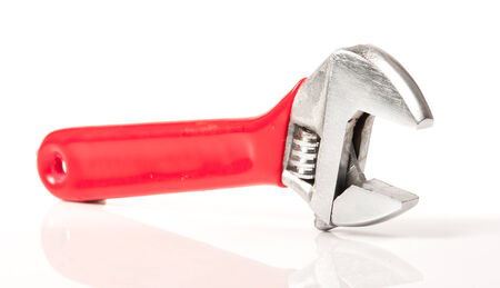 Red and Silver Metal Monkey Wrench Isolated On White Background.の写真素材