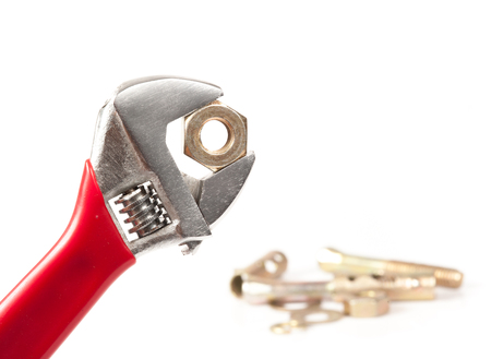 Bolt nut and red spanner.の写真素材
