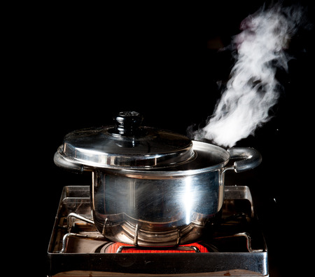 steam over cooking potの写真素材