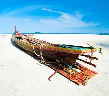 A wooden boat at Phi Phi Leh island, Thailandの写真素材